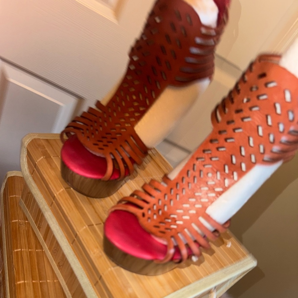 Elegant Cut-Out Heeled Sandals. The color is like brick